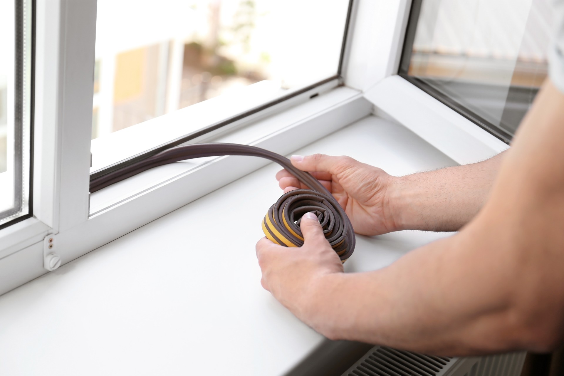 Weatherstripping windows 1